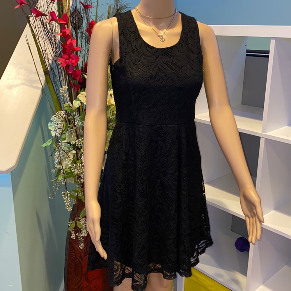 Like new! Black dress with lace detailing.